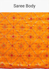 Chrome yellow bandhani printed dola silk saree with weaved work Online - Kalki Fashion