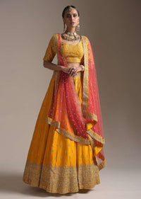 Chrome Yellow Lehenga Choli In Raw Silk With Zari And Sequins Embroidered Buttis And Intricate Border Work