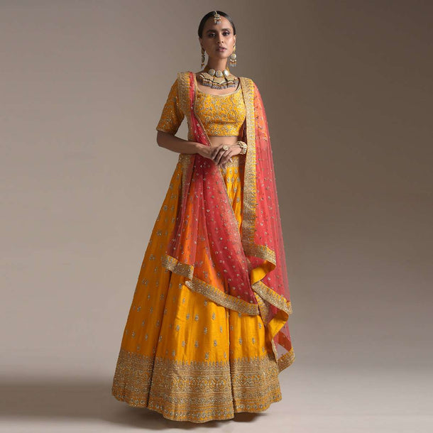 Chrome Yellow Lehenga Choli In Raw Silk With Zari And Sequins Embroidered Buttis And Intricate Border Work