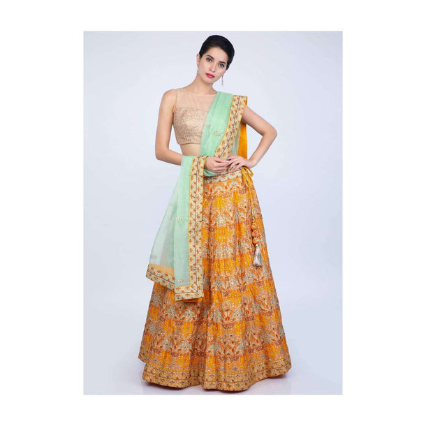 Chrome Yellow Lehenga In Patola Printed Cotton Silk Paired With Sea Green Organza Dupatta Online - Kalki Fashion