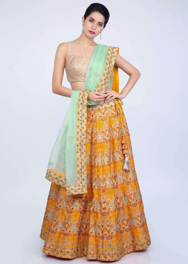 Chrome Yellow Lehenga In Patola Printed Cotton Silk Paired With Sea Green Organza Dupatta Online - Kalki Fashion