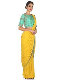 Chrome yellow pre stitched saree with turq ready embroidered blouse only on Kalki