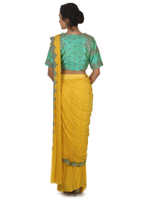 Chrome yellow pre stitched saree with turq ready embroidered blouse only on Kalki