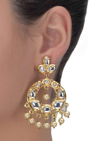 Circular gold plated danglers with kundan and pearls only on Kalki