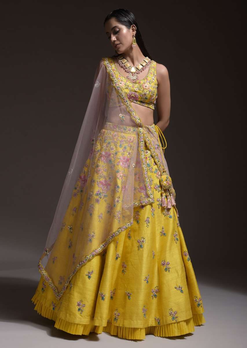 Citrus Lehenga Choli In Raw Silk With Resham Embroidered Spring Blooms And Gradating Floral Buttis