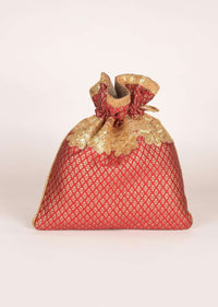 Claret Red And Gold Potli Bag In Brocade With Weaved Buttis Online - Kalki Fashion