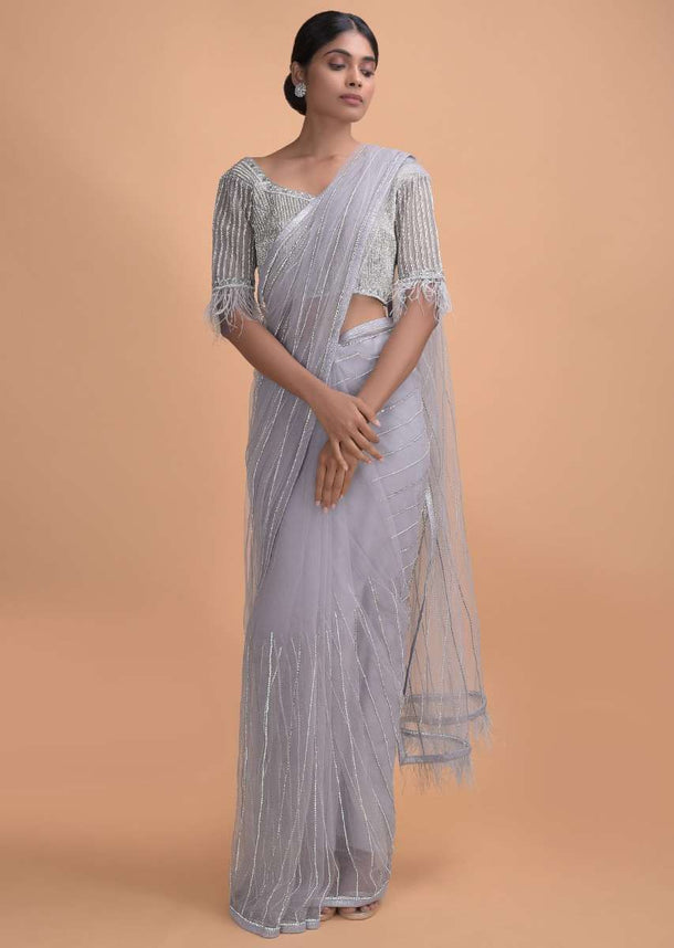 Cloud Grey Saree In Net With Kundan Work In Stripes Pattern And Feathers On The Pallu Online - Kalki Online