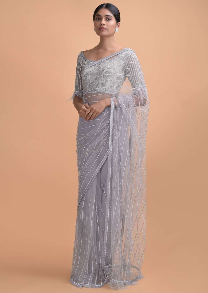 Cloud Grey Saree In Net With Kundan Work In Stripes Pattern And Feathers On The Pallu Online - Kalki Online