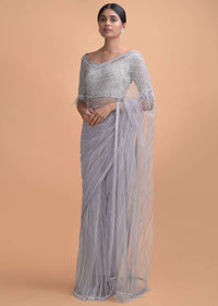 Cloud Grey Saree In Net With Kundan Work In Stripes Pattern And Feathers On The Pallu Online - Kalki Online