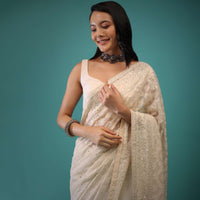 Cloud Cream Saree In Lucknowi Threadwork In A Moroccan Jaal, Mirror Abla And Cut Dana Detailing Work On The Pallu