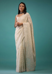 Cloud Cream Saree In Lucknowi Threadwork In A Moroccan Jaal, Mirror Abla And Cut Dana Detailing Work On The Pallu