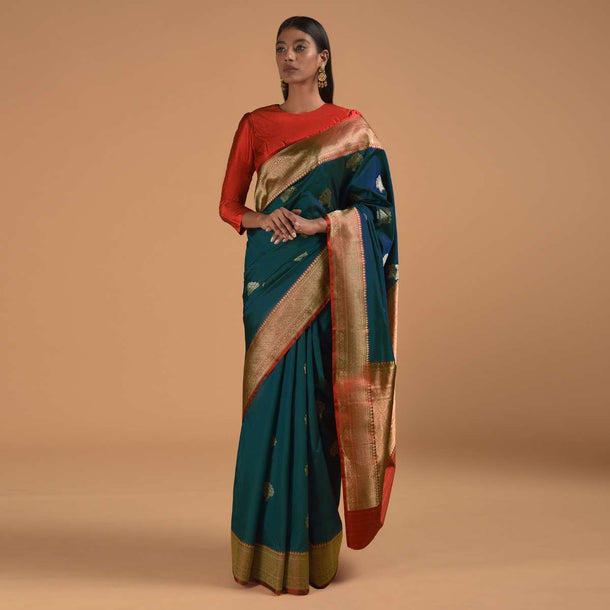 Cobalt Blue Pure Handloom Saree In Silk With Woven Tree Buttis And Red Border Online - Kalki Fashion