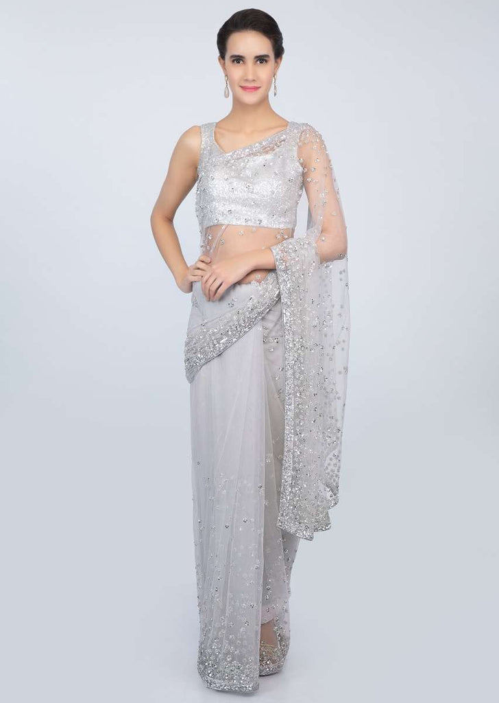 Coin grey sheer net saree with sequins embroidered butti and border only on kalki