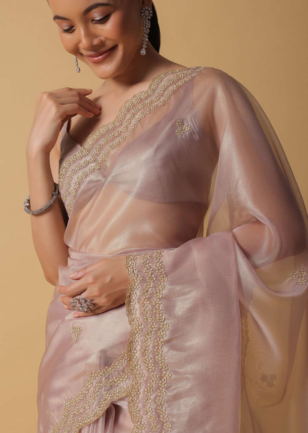 Copper Toned Foil Saree Fabricated In Tissue With Embroidered Borders