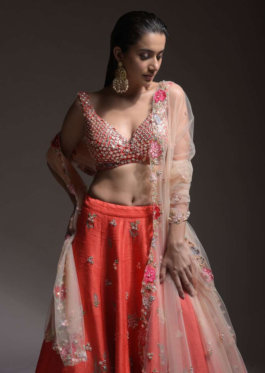 Coral Lehenga Choli With Resham Embroidered Summer Blossoms Along The Hemline And Scattered Buttis