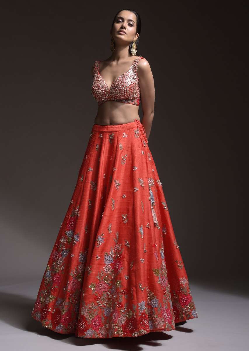 Coral Lehenga Choli With Resham Embroidered Summer Blossoms Along The Hemline And Scattered Buttis