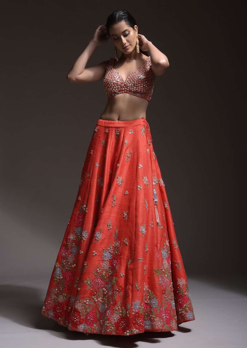 Coral Lehenga Choli With Resham Embroidered Summer Blossoms Along The Hemline And Scattered Buttis