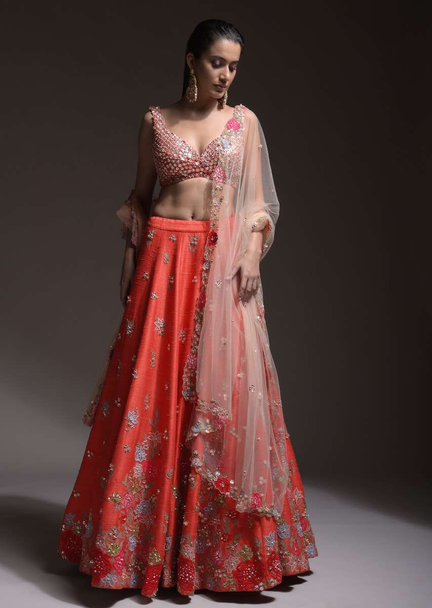 Coral Lehenga Choli With Resham Embroidered Summer Blossoms Along The Hemline And Scattered Buttis