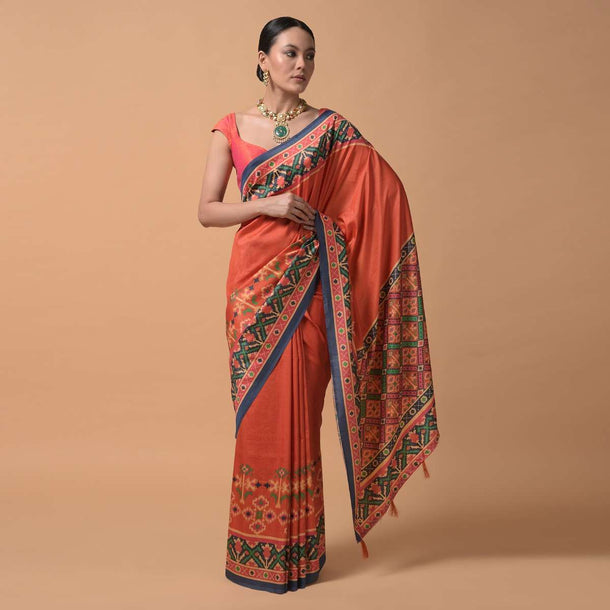 Coral Orange Saree In Silk With Printed Patola Design On The Border Online - Kalki Fashion