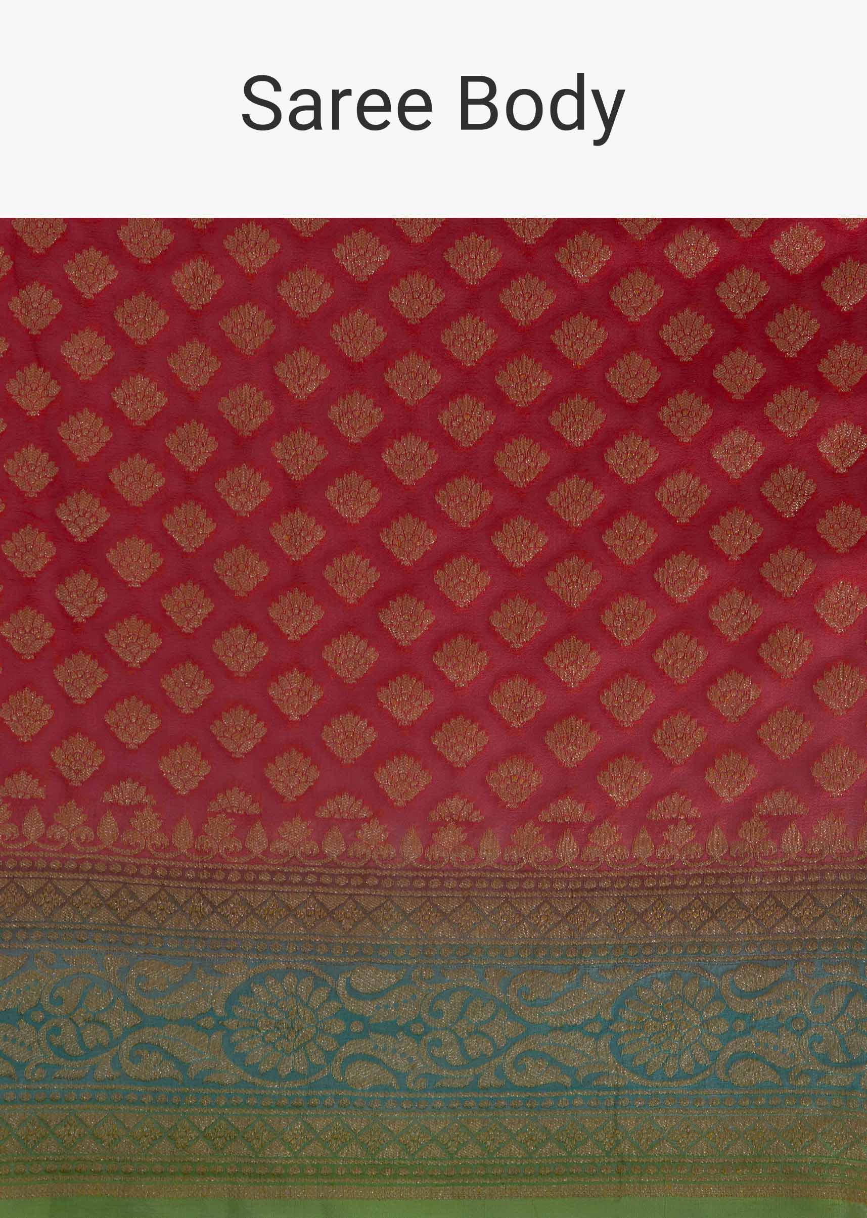 Coral peach saree in georgette embellished in weaved butti all over