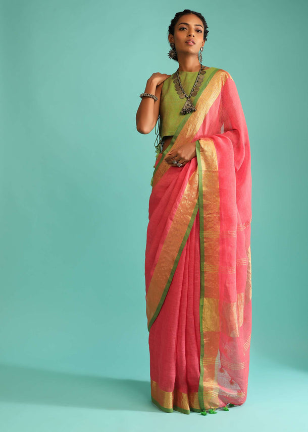 Coral Peach Saree In Linen With Golden Brocade Border And Striped Pallu Along With Green Unstitched Blouse Online - Kalki Fashion