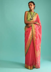 Coral Peach Saree In Linen With Golden Brocade Border And Striped Pallu Along With Green Unstitched Blouse Online - Kalki Fashion