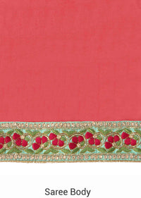 Coral pink saree matched with embroidered blouse only on Kalki