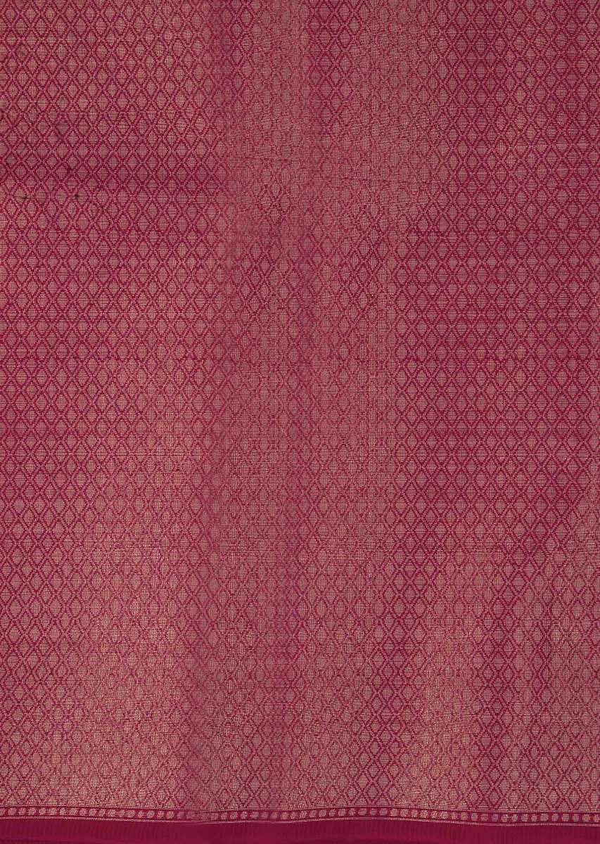 Coral red tussar silk saree with weaved work in floral motif 