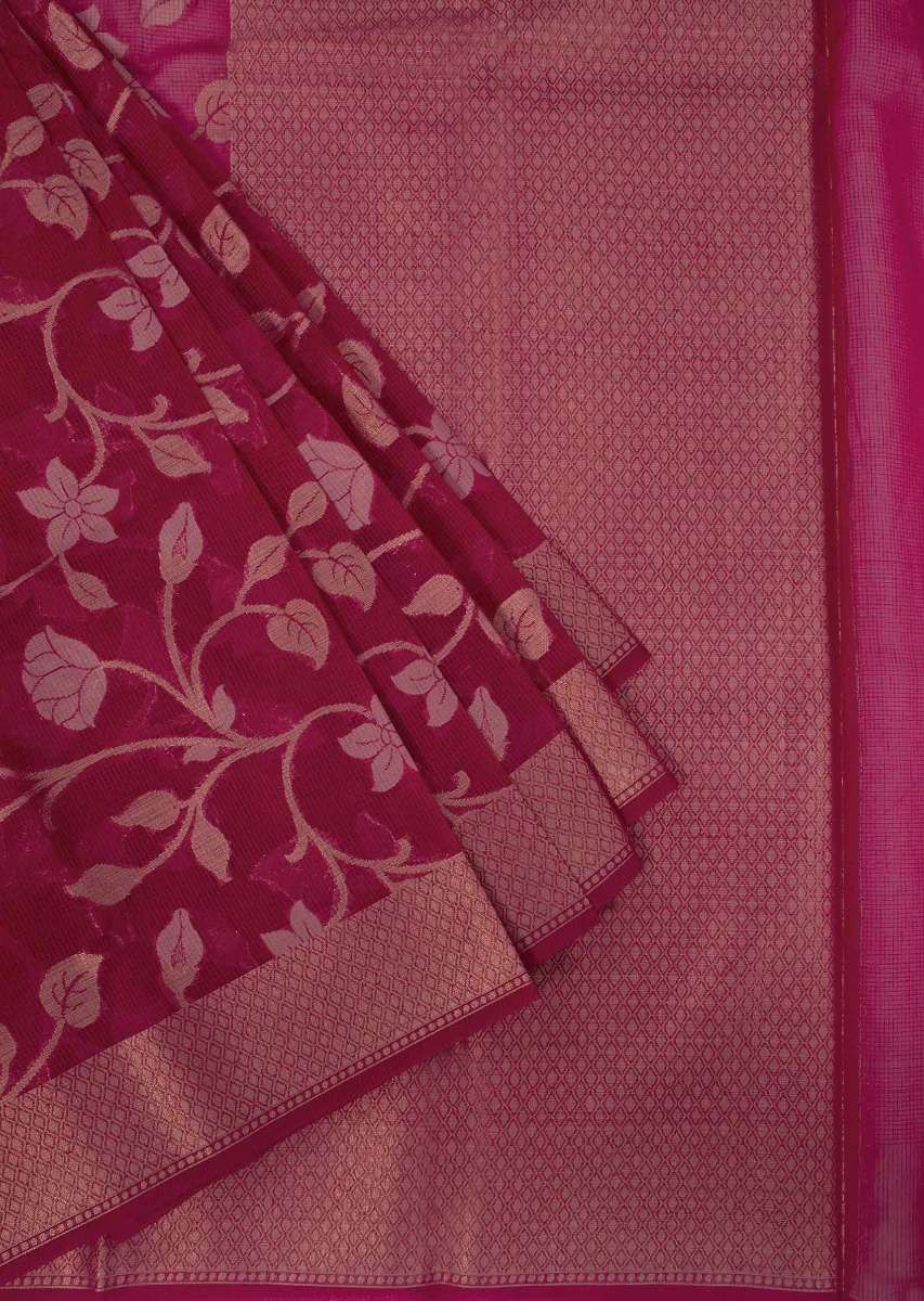 Coral red tussar silk saree with weaved work in floral motif 