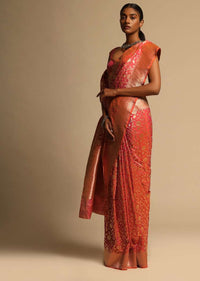 Coral Two Toned Banarasi Saree In Pure Handloom Silk With Woven Floral Jaal And Chevron Border Along With Unstitched Blouse Piece