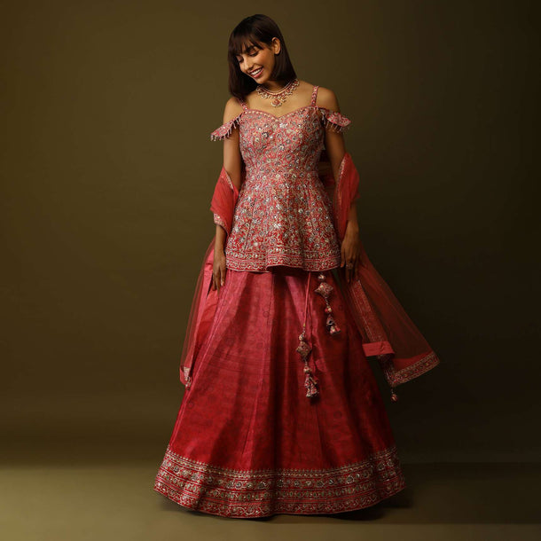 Coral Peach And Red Shaded Lehenga And Peplum Top With Floral Print, Mirror Work And Cold Shoulder Sleeves Online - Kalki Fashion