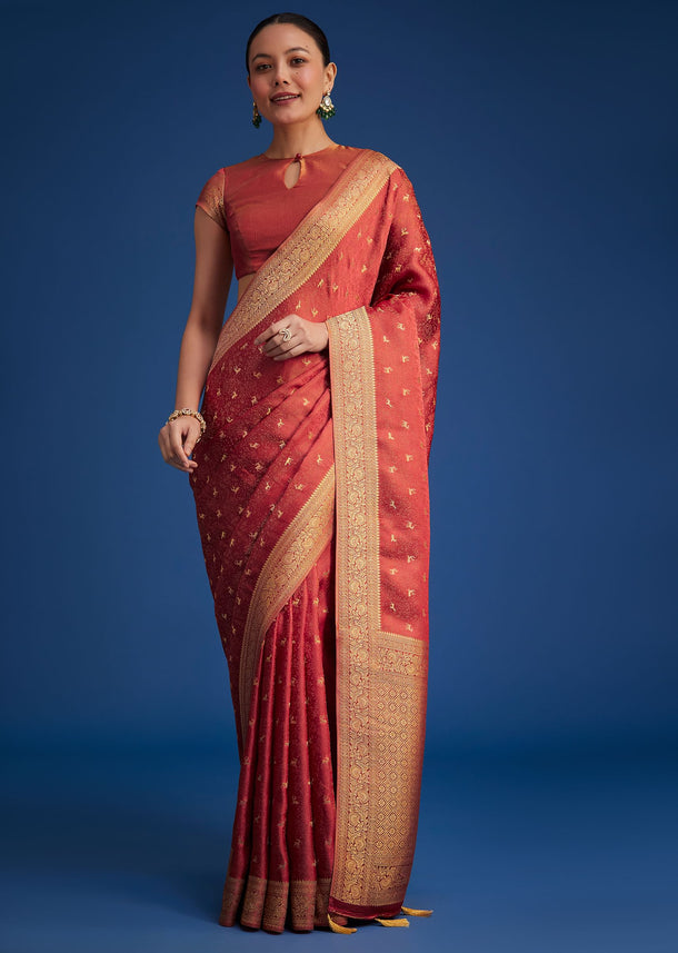 Dusky Orange Tissue Silk Saree With Zari Border And Butti Work