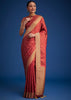 Dusky Orange Tissue Silk Saree With Zari Border And Butti Work