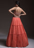 Coral Tiered Skirt And Crop Top With Cutdana Embellished Floral Blossoms And Ruffle Dupatta