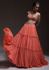 Coral Tiered Skirt And Crop Top With Cutdana Embellished Floral Blossoms And Ruffle Dupatta