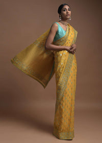 Corn Yellow Banarsi Saree In Georgette With Golden And Silver Weaved Checks And Floral Buttis Online - Kalki Fashion