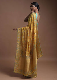 Corn Yellow Banarsi Saree In Georgette With Golden And Silver Weaved Checks And Floral Buttis Online - Kalki Fashion