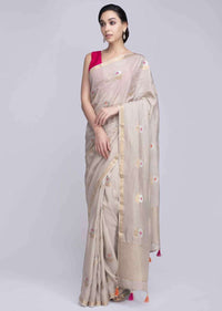 Cream dola silk saree with weaved floral butti only on Kalki
