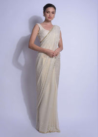 Cream Gold Saree In Shimmer Georgette With Embellished  Floral Buttis Online - Kalki Fashion