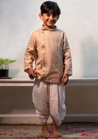 Kalki Boys Cream Kurta In Hand-woven Cotton Silk With Zari Enhanced Placket And Twisted Design At The Neck Love The World Today