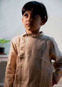 Kalki Boys Cream Kurta In Hand-woven Cotton Silk With Zari Enhanced Placket And Twisted Design At The Neck Love The World Today