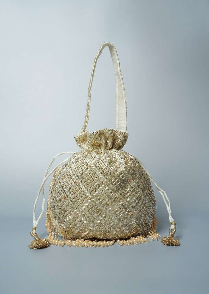 Cream Potli Bag Adorned In Heavy Cut Dana Work In Checks