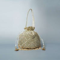 Cream Potli Bag Adorned In Heavy Cut Dana Work In Checks