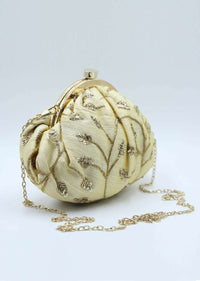 Cream raw silk curvaceous clutch in jaal embroidery only on Kalki