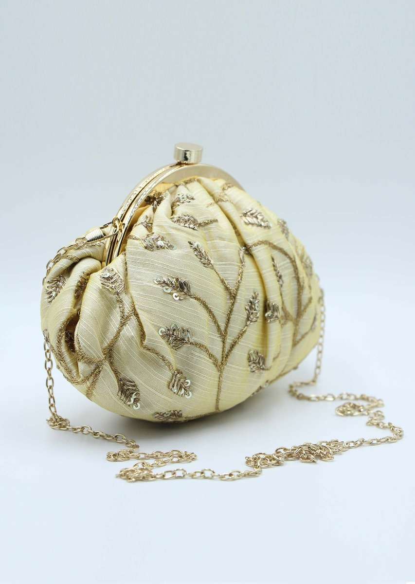 Cream raw silk curvaceous clutch in jaal embroidery 