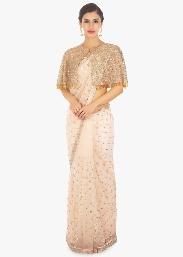 Cream rose net saree in sequins butti and cut dana borde