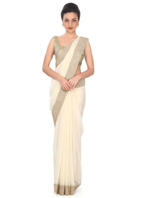 Moss cream saree adorn in moti and kardana embroidery only on Kalki