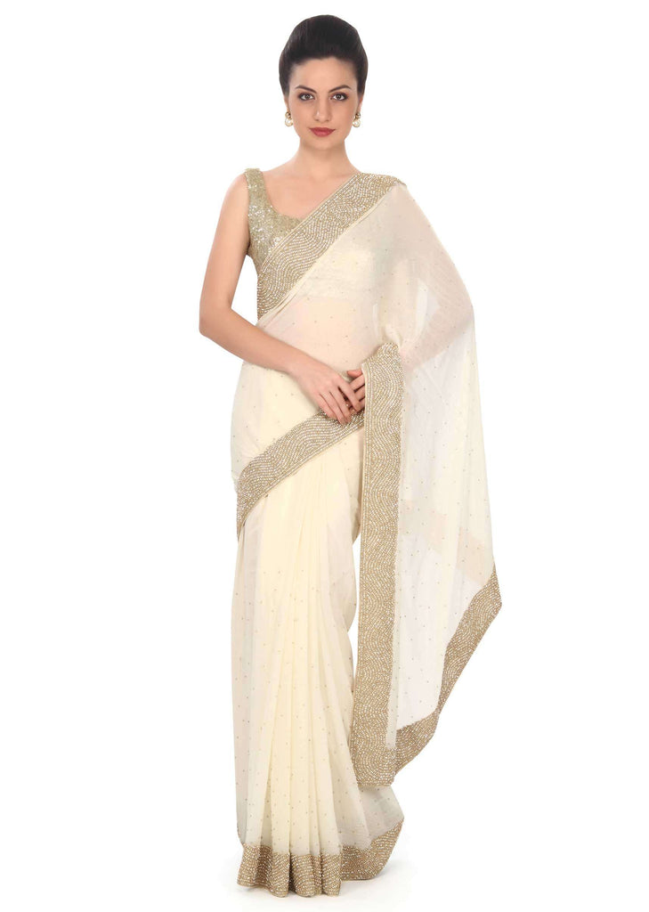 Moss cream saree adorn in moti and kardana embroidery only on Kalki