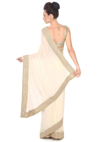 Moss cream saree adorn in moti and kardana embroidery only on Kalki