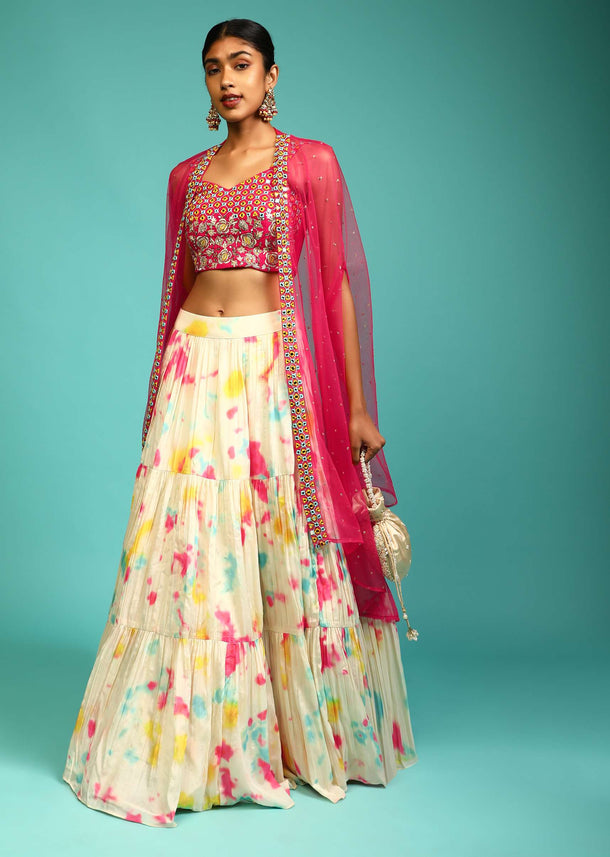 Cream Tie Dye Printed Skirt And Hot Pink Crop Top Set With Mirror Abla Embroidery And Net Cape Jacket